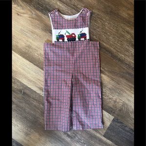 smocked dump trucks in plaid overall rompers